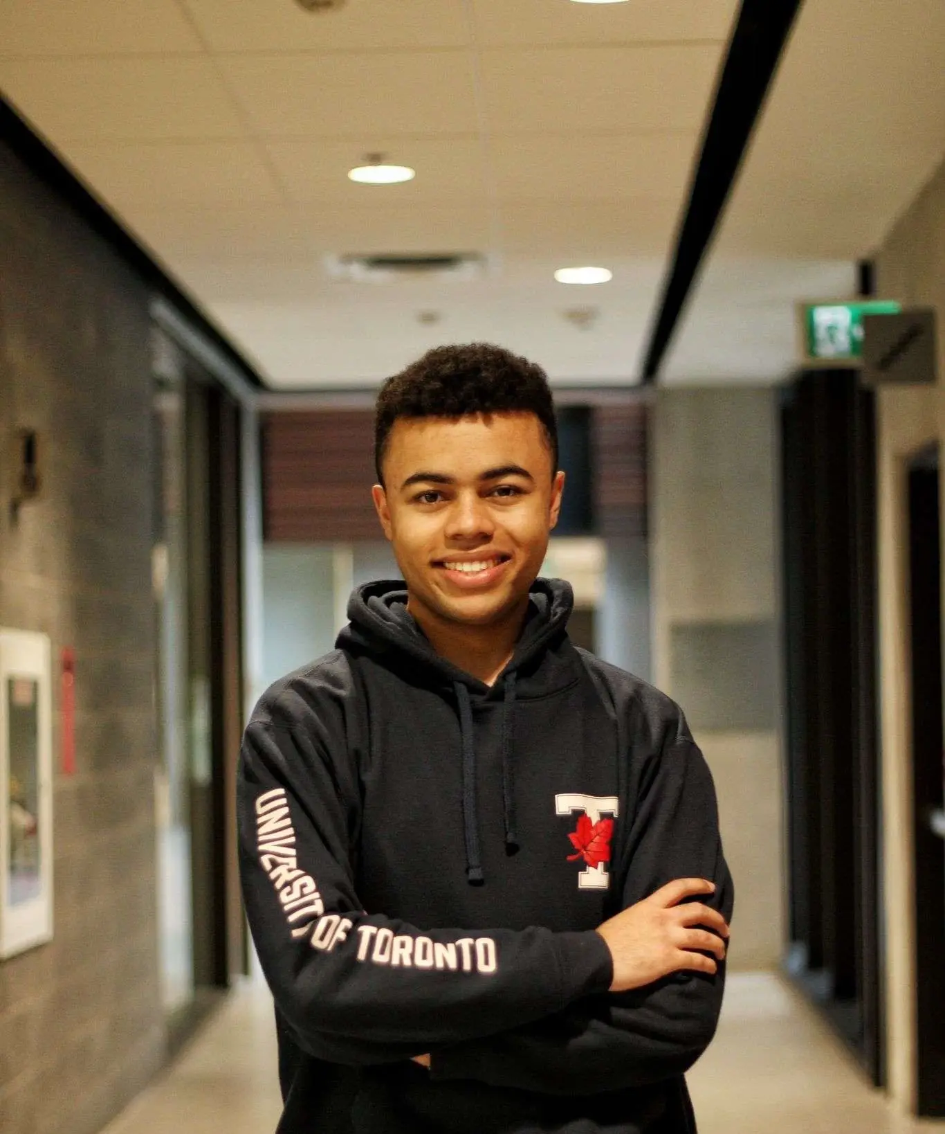 Ehab pictured in the University of Toronto wearing a UofT sweater.